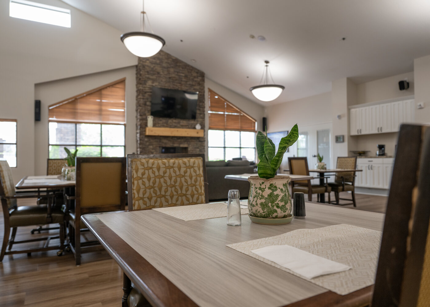 Dining and fireplace area at Pheasant View Assisted Living